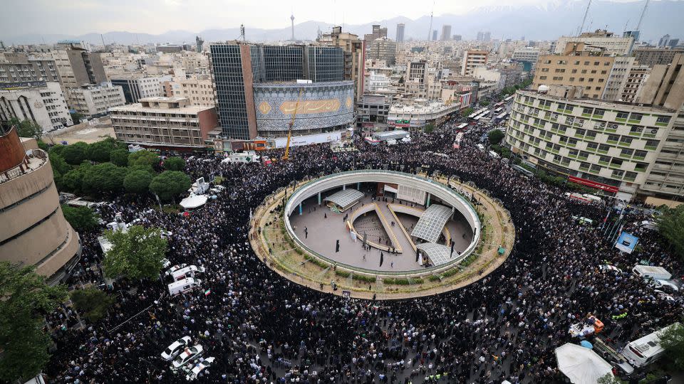 Mourners gathered in Valiasr Square in central Tehran on Monday. - Atta Kenare/AFP/Getty Images
