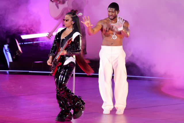 <p>Ethan Miller/Getty</p> H.E.R. and Usher perform during the Super Bowl Halftime Show in Las Vegas on Feb. 11, 2024