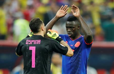 Soccer Football - World Cup - Group H - Poland vs Colombia - Kazan Arena, Kazan, Russia - June 24, 2018 Colombia's Davinson Sanchez and David Ospina celebrate victory after the match REUTERS/John Sibley