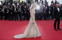 Voice actress actress Melanie Laurent and voice actor Gilles Lellouche pose on the red carpet as they arrive for the screening of the animated film "Inside Out" (Vice Versa) out of competition at the 68th Cannes Film Festival in Cannes, southern France, May 18, 2015. REUTERS/Regis Duvignau TPX IMAGES OF THE DAY