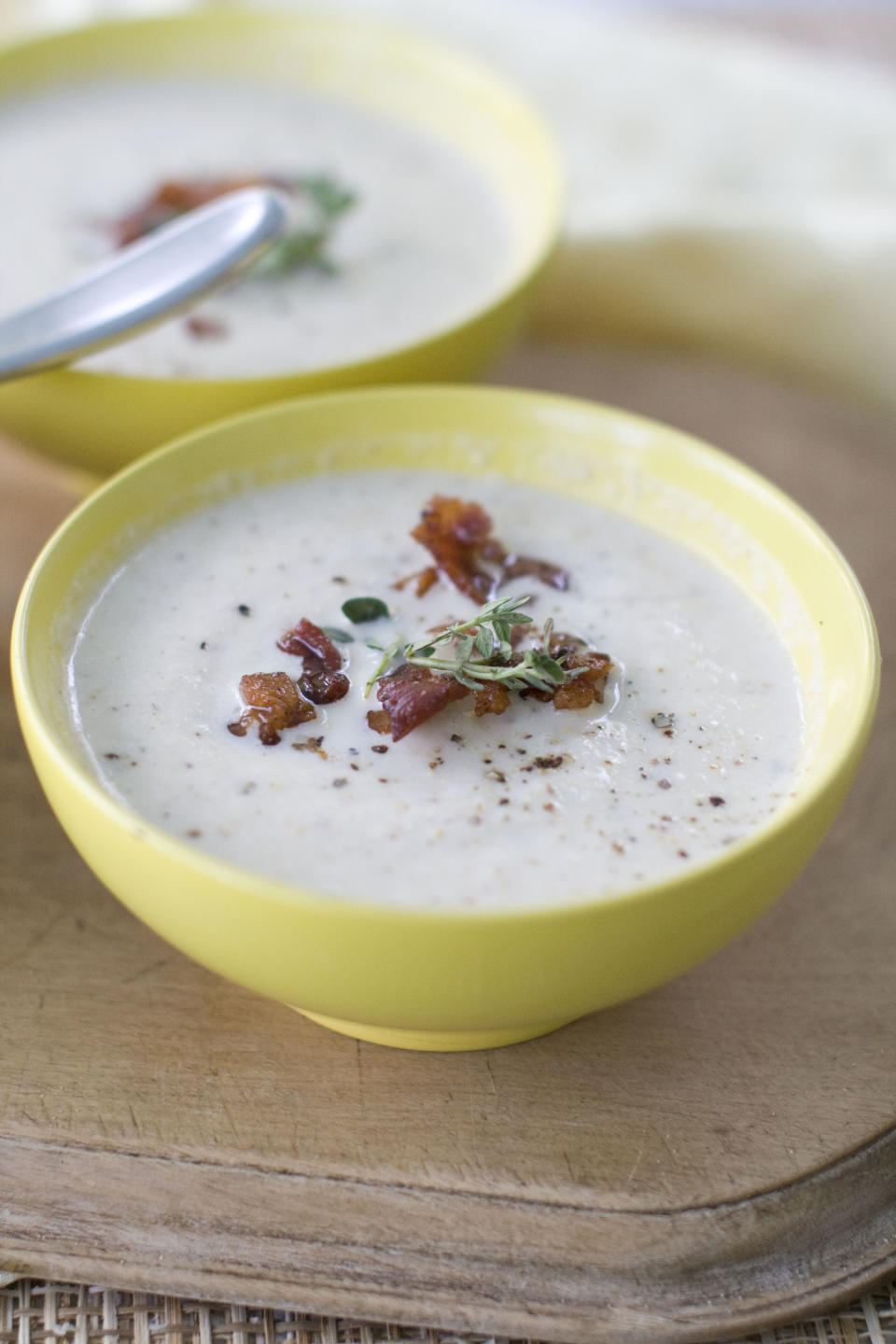 This Aug. 26, 2013 photo shows roasted cauliflower soup with bacon and thyme in Concord, N.H. (AP Photo/Matthew Mead)