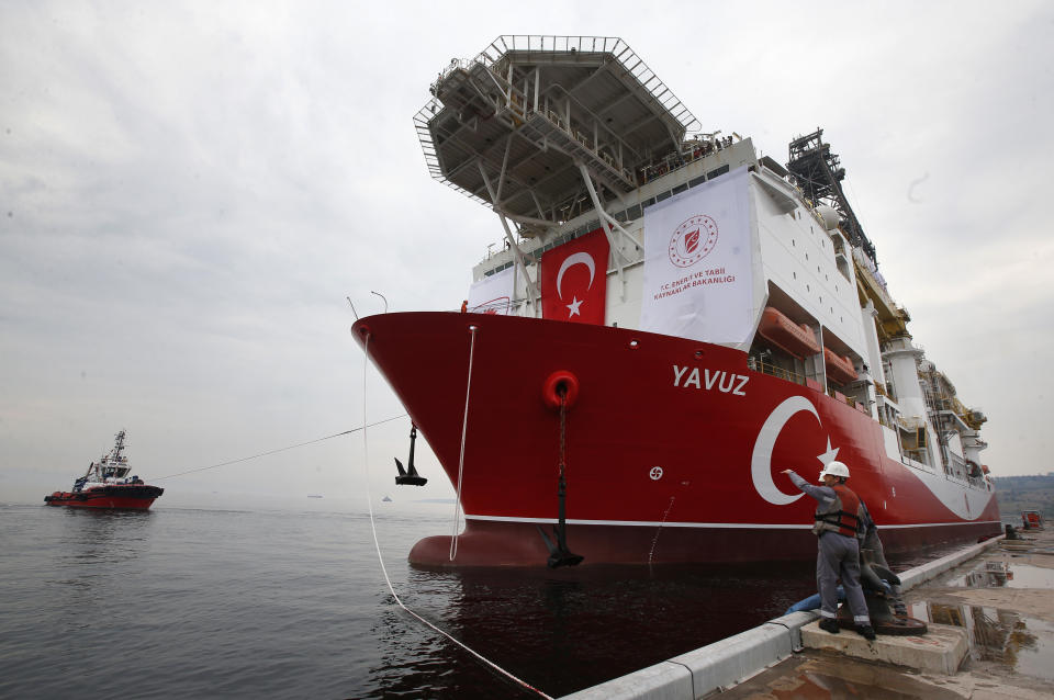 Turkey's 230-meter (750-foot) drillship 'Yavuz' leaves the port of Dilovasi, outside Istanbul, on its way to the Mediterranean, Thursday, June 20, 2019. Turkey had launched Yavuz, that it says will drill for gas off neighboring Cyprus despite European Union warnings to refrain from such illegal actions that could incur sanctions against Ankara. (AP Photo/Lefteris Pitarakis)