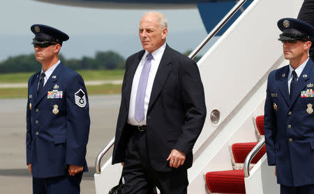 White House Chief of Staff John Kelly steps from Air Force One to accompany U.S. President Donald Trump to nearby Camp David for a meeting with the National Security Council, in Hagerstown, Maryland, U.S., August 18, 2017. REUTERS/Kevin Lamarque