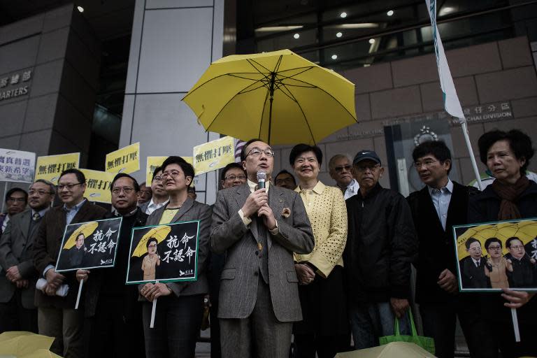 Pro-democracy legislator Alan Leong talks to the media outside the Wanchai police station in Hong Kong, on March 2, 2015