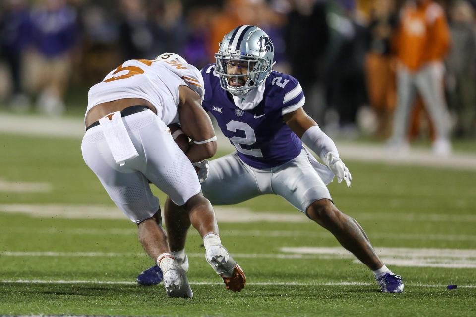 Kansas State Wildcats safety Kobe Savage (2) tackles Texas Longhorns running back Bijan Robinson (5) during the fourth quarter at Bill Snyder Family Football Stadium. Mandatory Credit: Scott Sewell-USA TODAY Sports
(No credit)
