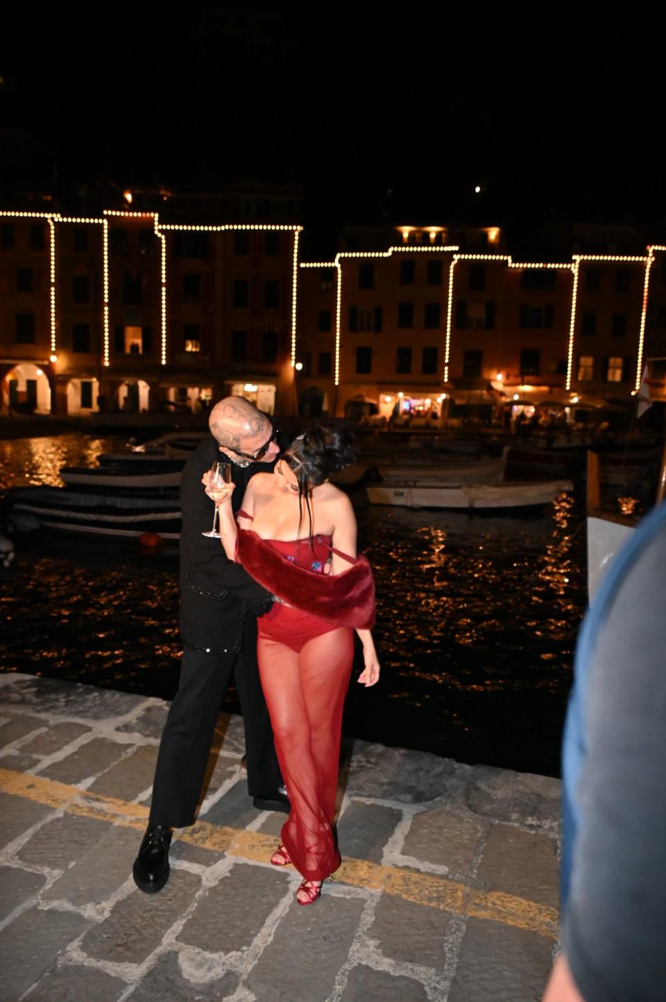 Kim, Khloe, Kourtney Kardashian, and family were seen out for dinner in Portofino before Kourtney and Travis Barker’s wedding. - Credit: IPA / SplashNews.com