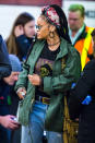 <p>Rihanna embodies effortless street style in a faded Army jacket. (Photo: Alessio Botticelli/FilmMagic) </p>