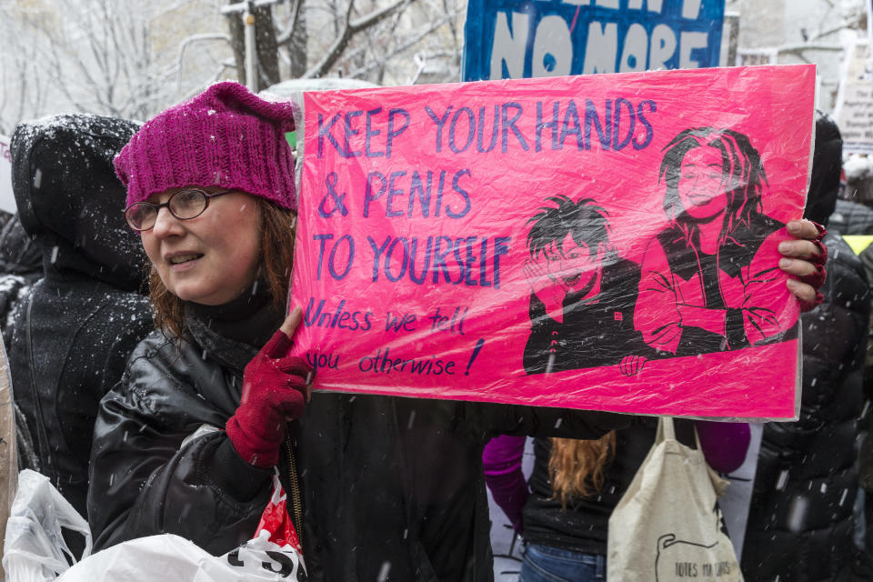 A #MeToo rally drew dozens of protesters to the Trump International Hotel at New York's Columbus Circle on Dec. 9. (Photo: Pacific Press via Getty Images)