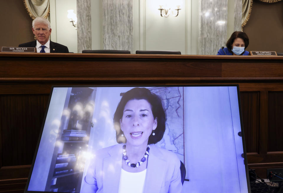 Commerce secretary-nominee Rhode Island Gov. Gina Raimondo testifies remotely during her nomination hearing before the Senate Commerce, Science and Transportation Committee on Capitol Hill in Washington, Tuesday, Jan. 26, 2021. (Jonathan Ernst/Pool via AP)