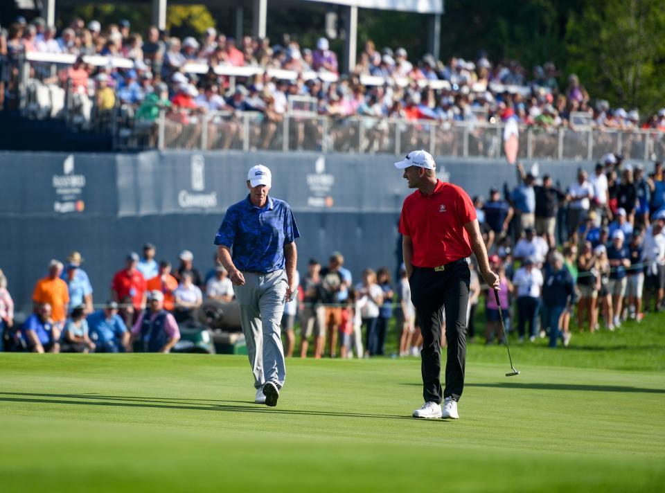 Steve Stricker and Robert Karlsson walk from the fairway to the green while replaying hole 18 in sudden-death overtime at the Sanford International on Sunday, September 18, 2022, at the Minnehaha Country Club in Sioux Falls.