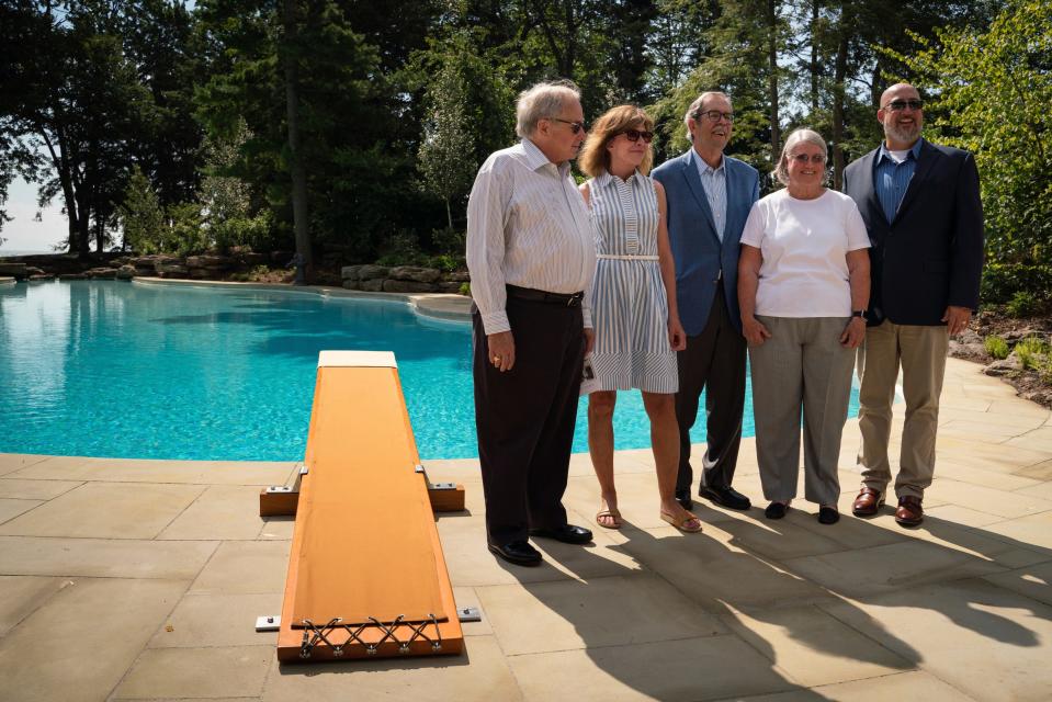 Edsel Ford II, grandson of Edsel Ford I, left, his wife Cynthia Ford, Secretary David Hempstead, Lynn Ford Alandt, Board Chair and granddaughter of Edsel and Eleanor Ford, and Mark J. Heppner, President and CEO of the Ford House, stand for a photo during a restoration celebration at the Ford House in Grosse Pointe Shores on Monday, August 1, 2022.