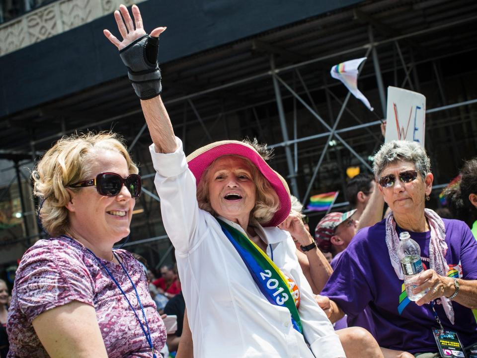 Edie Windsor, who successfully sued the United States government in a court case that went to the Supreme Court for banning gay marriage in California, waves to revelers