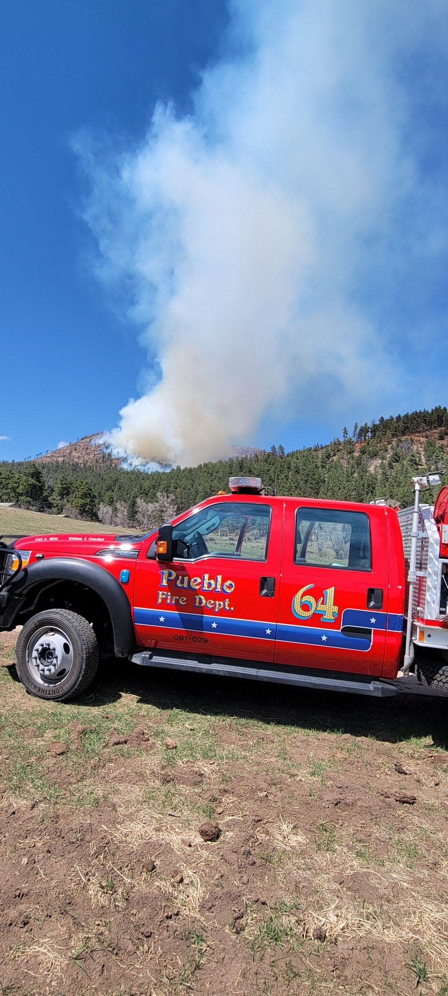 Smoke rises from the North Creek Fire Saturday, April 15