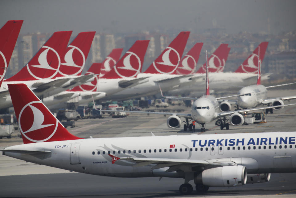 Turkish Airlines airplanes at Ataturk International Airport, in Istanbul, Friday, April 5, 2019, ahead of its closure. The relocation from Ataturk International Airport to Istanbul Airport on the Black Sea shores— dubbed the "Great Move"—began early Friday and is expected to end Saturday. Ataturk Airport, ranked 17th busiest in the world in 2018 according to preliminary statistics, will cease commercial operations at 02:00 am local Saturday (2300 GMT Friday.) (AP Photo/Lefteris Pitarakis)