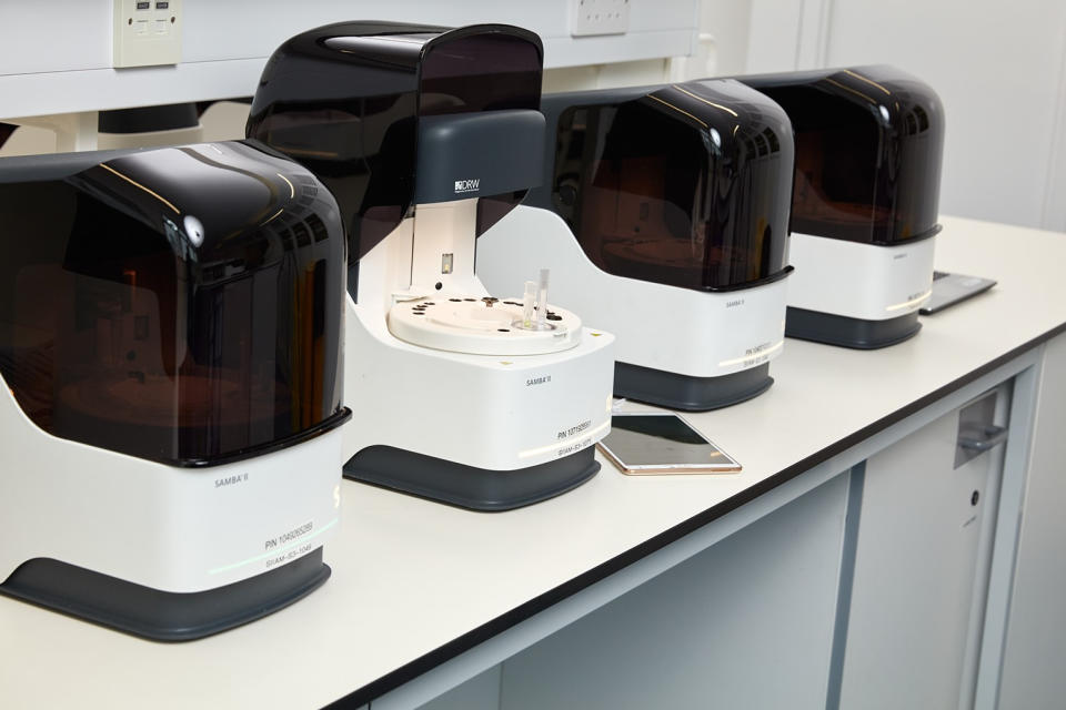 Undated handout photo issued by Cambridge University Hospitals showing SAMBA II testing machines at the NIHR Clinical Research Facility at AddenbrookeÕs Hospital in Cambridge.