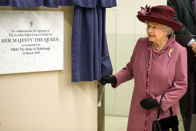 <p>Arthur Edwards/WPA Pool/Getty</p> Queen Elizabeth opens the new cancer center at the London Clinic in March 2010.