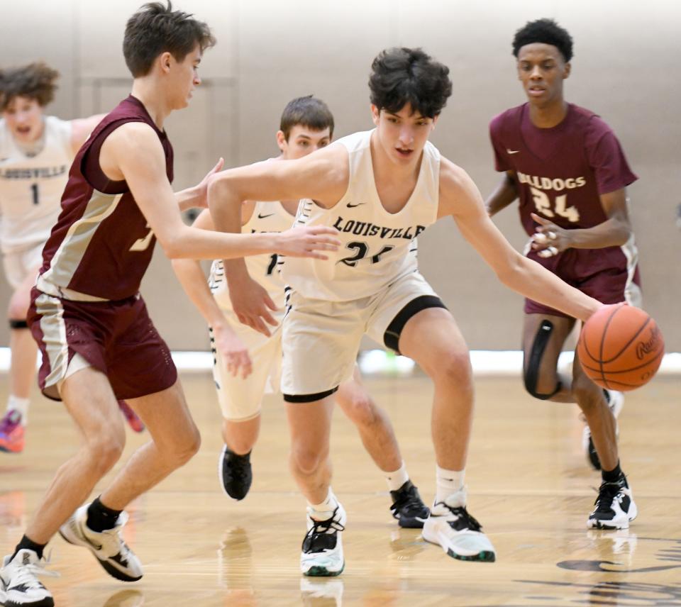 Louisville's Hayden Nigro, shown here during a game against Woodridge on Jan. 15, scored a game-high 29 points in the Leopards' 68-66 win at Jackson on Tuesday.