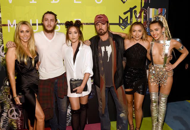 <p>Larry Busacca/Getty</p> Tish Cyrus, Braison Cyrus, Noah Cyrus, Billy Ray Cyrus, and Brandi Cyrus in 2015