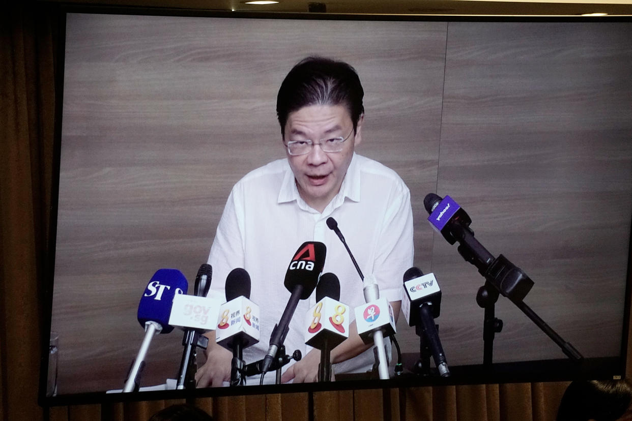 National Development Minister Lawrence Wong noted that priority would be given to industries that “critical to the economy and to local employment, and that keep us connected to the world and global supply chains”. (PHOTO: Dhany Osman / Yahoo News Singapore)