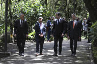 Secretary of State Antony Blinken visits the Jose Celestino Mutis botanical garden with U.S. Ambassador to Colombia Philip S. Goldberg, Mayor of Bogota Claudia Lopez and Colombian Minister of the Environment and Sustainable Development Carlos Eduardo Correa in Bogota, Colombia, Thursday, Oct. 21, 2021. (Luisa Gonzalez/Pool via AP)