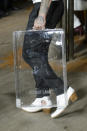 <p><i>Clear Lucite briefcase from the Helmut Lang SS18 collection. (Photo: ImaxTree) </i></p>