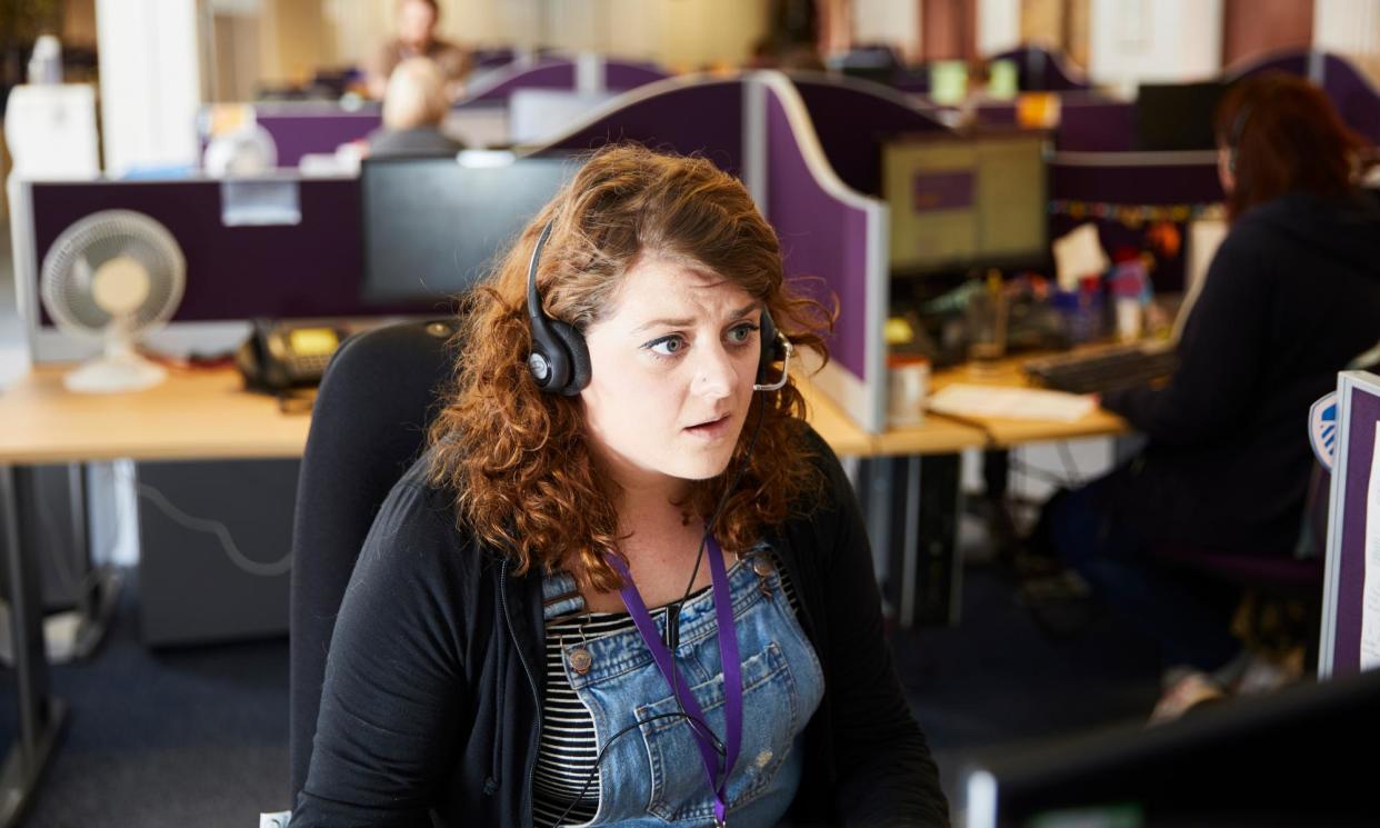 <span>Advisers taking calls at StepChange in Leeds. The charity has seen a rise in the number of people seeking help.</span><span>Photograph: Christopher Thomond/The Guardian</span>