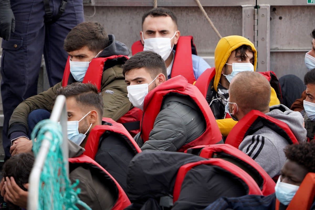 A group of people thought to be migrants, are brought in to Dover, Kent, from a Border Force vessel (Gareth Fuller/PA) (PA Wire)