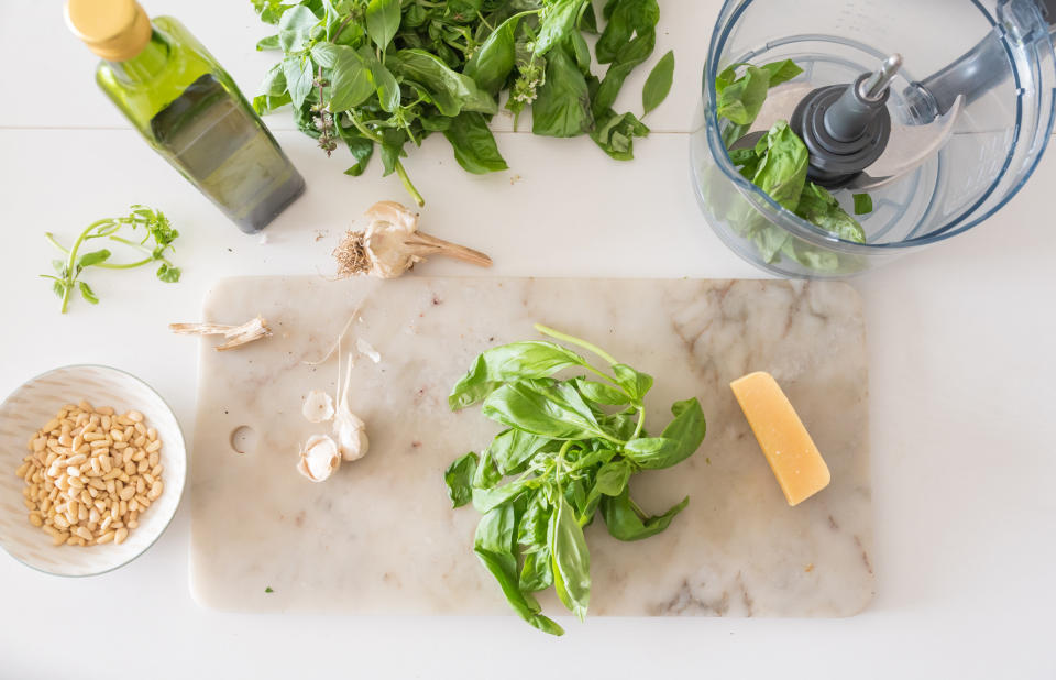 Fresh ingredients for homemade basil pesto.