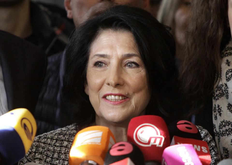 Salome Zurabishvili, former Georgian Foreign minister and presidential candidate, speaks to the media at her campaign headquarter in Tbilisi, Georgia, Wednesday, Nov. 28, 2018. the French-born former foreign minister of Georgia Zurabishvili celebrated what she claims is her victory in a tight presidential runoff Wednesday that marks the last time Georgians elect their head of state by popular vote. (AP Photo/Shakh Aivazov)