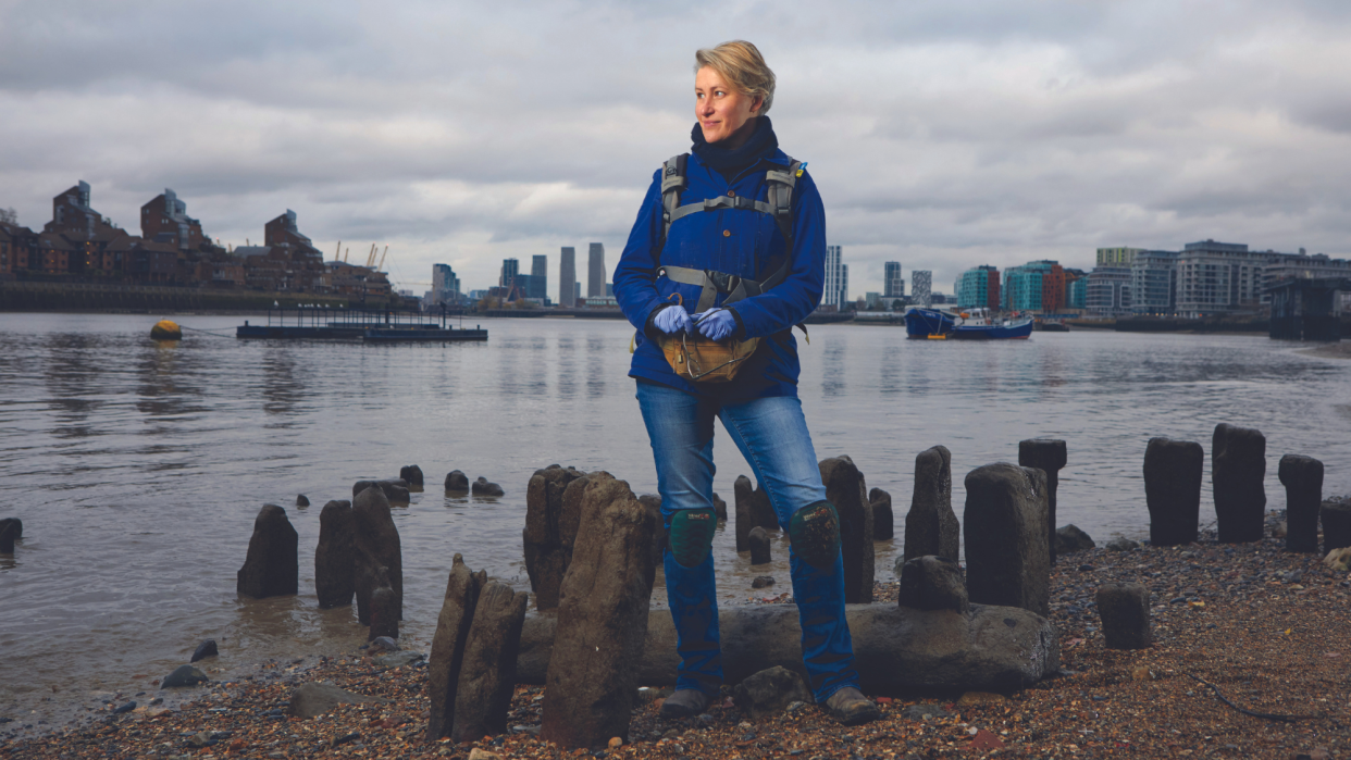  Author and mudlarker Lara Maiklem on the bank of the Thames. 