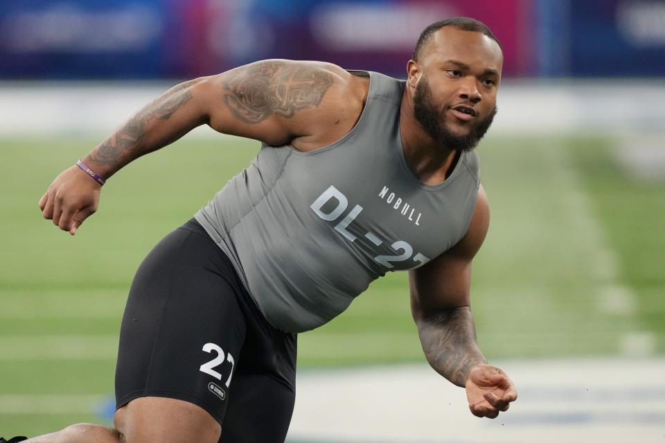 LSU defensive lineman Mekhi Wingo participates in a drill during the NFL combine at Lucas Oil Stadium on Feb. 29, 2024 in Indianapolis.