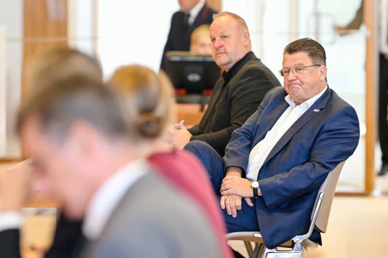 Stephan Brandner (R) and Kay-Uwe Ziegler, AfD member of the Bundestag, sit in the hearing room of the German Constitutional Court. In the current legislative period, AfD candidates have failed to win seats in the committees on internal affairs, health and development cooperation. Uwe Anspach/dpa