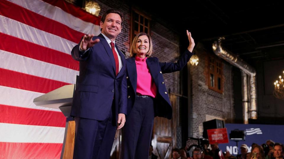Florida Governor and U.S. Presidential candidate Ron DeSantis and Iowa Governor Kim Reynolds stand together as Reynolds endorses DeSantis in the 2024 presidential race at a rally, in Des Moines, Iowa, U.S. November 6, 2023 (REUTERS/Rachel Mummey)