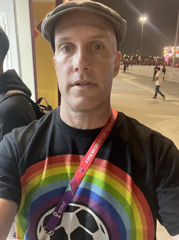 A selfie shows Grant Wahl with a t-shirt supporting LGBTQ rights, who got detained by Qatar World Cup security in Al Rayyan