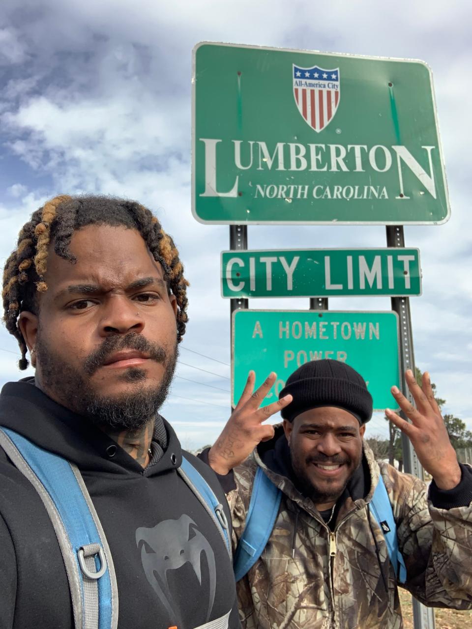 Twins Davon and Tavon Woods have walked in several different states, including North Carolina, and they have talked to foster kids along the way.