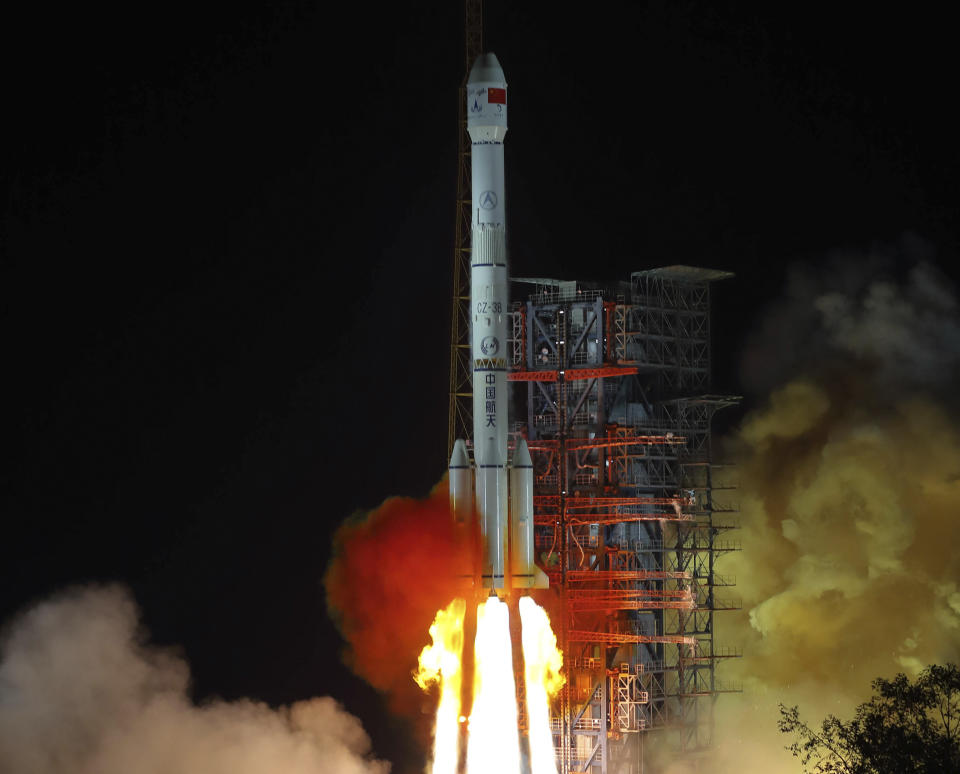 In this photo released by Xinhua News Agency, the Chang'e 4 lunar probe launches from the the Xichang Satellite Launch Center in southwest China's Sichuan Province, Saturday, Dec. 8, 2018. China launched a ground-breaking mission Saturday to soft-land a spacecraft on the largely unexplored far side of the moon, demonstrating its growing ambitions as a space power to rival Russia, the European Union and U.S. (Jiang Hongjing/Xinhua via AP)