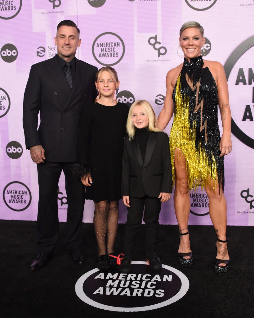 pink on the red carpet at the 2022 american music awards with husband carey hart and kids willow and jameson