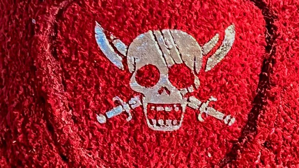 One Piece x Puma Collaboration Shanks Red haired pirate jolly roger symbol closeup