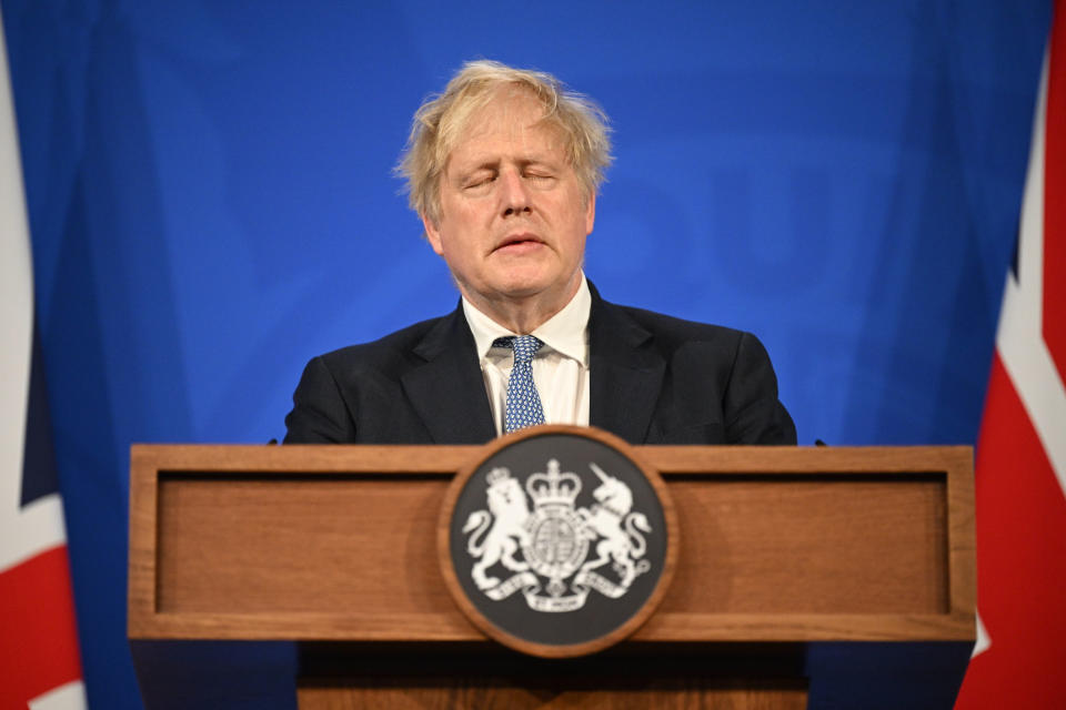 FILE - Britain's Prime Minister Boris Johnson speaks during a press conference in Downing Street, London, Wednesday, May 25 2022, following the publication of Sue Gray's report into Downing Street parties in Whitehall. British media say Prime Minister Boris Johnson has agreed to resign on Thursday, July 7 2022, ending an unprecedented political crisis over his future. (Leon Neal/Pool Photo via AP, File)