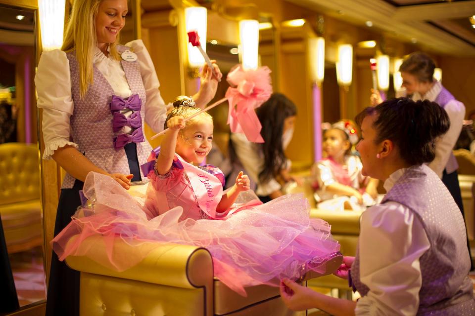 When young princesses-to-be make their royal entrance at the Bibbidi Bobbidi Boutique, they are greeted by their very own Fairy Godmother-in-training who transforms them with magical makeovers.