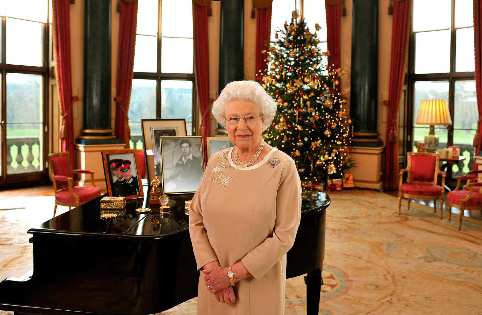 LONDON - DECEMBER : (NO PUBLICATION IN UK MEDIA FOR 28 DAYS) Queen Elizabeth II stands in the Music Room of Buckingham Palace after recording her Christmas day message to the Commonwealth on December 2008 in London, England.  (Anwar Hussein Collection/Rota/WireImage)