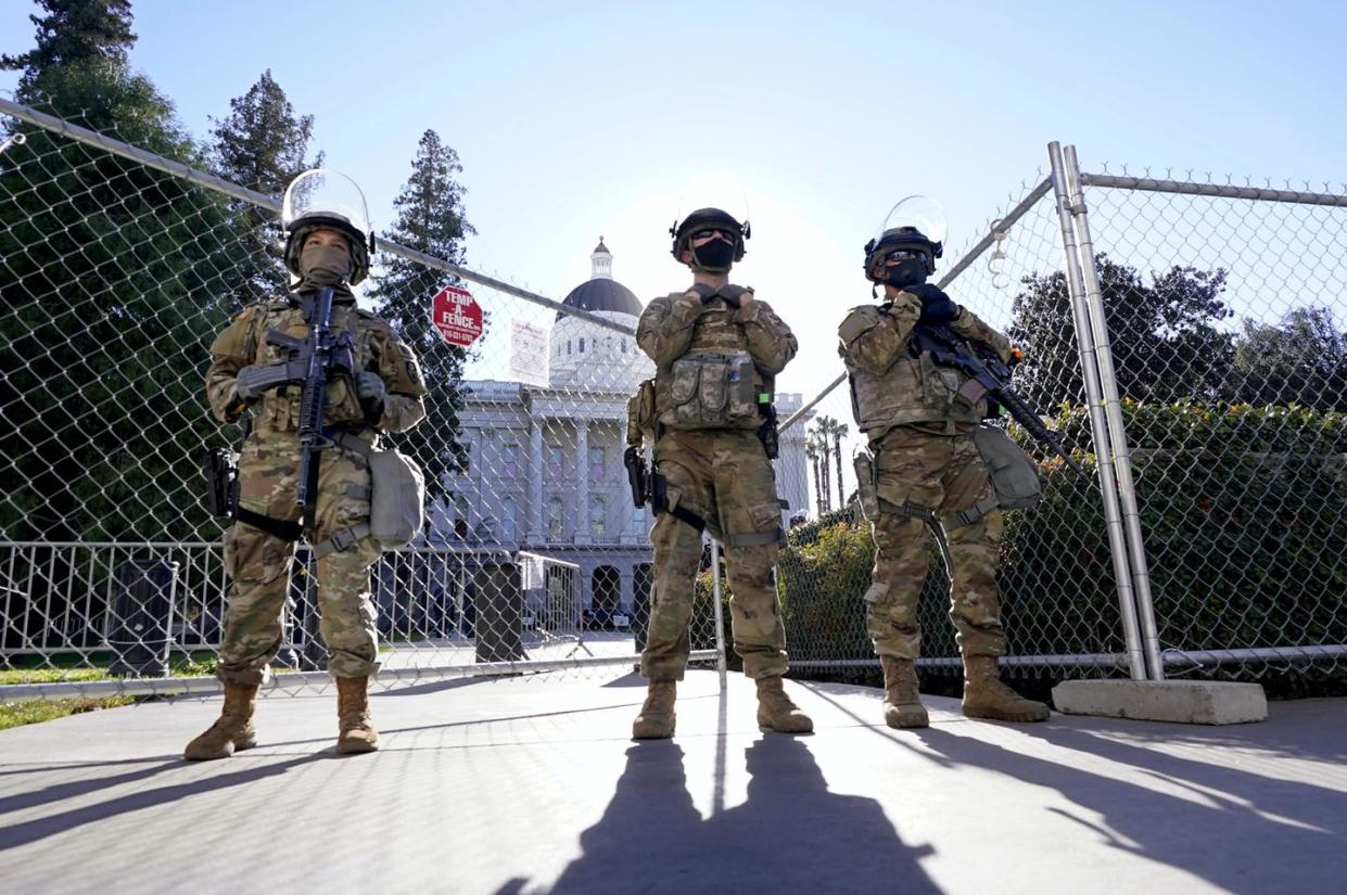 <span class="caption">The Second Amendment declares the importance of state-government authorized militias, like these National Guard troops guarding the California State Capitol building.</span> <span class="attribution"><a class="link " href="https://newsroom.ap.org/detail/CaliforniaGovernor-ThreatInvestigation/bcc5077a59904172915907871d881914/photo" rel="nofollow noopener" target="_blank" data-ylk="slk:AP Photo/Rich Pedroncelli;elm:context_link;itc:0;sec:content-canvas">AP Photo/Rich Pedroncelli</a></span>