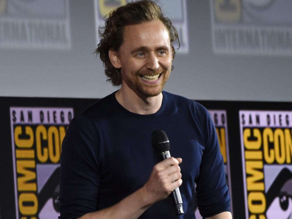 Tom Hiddleston speaks at the "Loki" portion of the Marvel Studios panel on day three of Comic-Con International on Saturday, July 20, 2019, in San Diego.