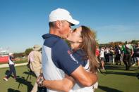 <p>Matt Kuchar of the United States kisses his wife, Sybi, after winning his match during the singles matches for the 41st Ryder Cup at Hazeltine National Golf Course on October 2, 2016 in Chaska, MN. (Photo by Montana Pritchard/PGA of America via Getty Images)</p>