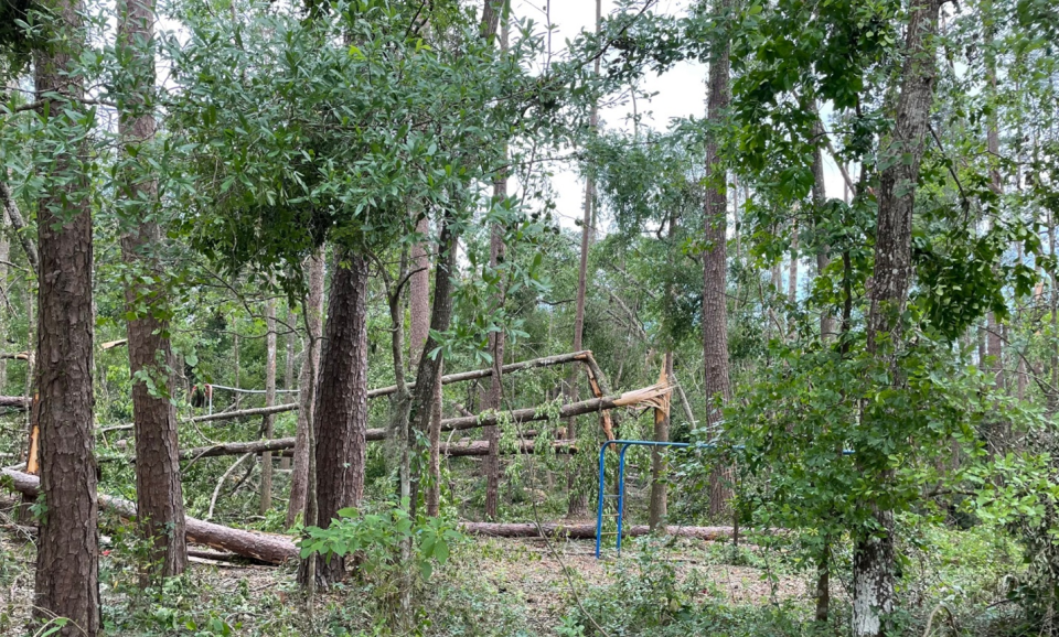 The playground area at Grassroots School was completely demolished by trees after three tornadoes tore through Tallahassee early Friday.