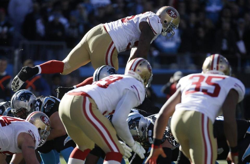 San Francisco 49ers outside linebacker Ahmad Brooks (55) jumps off sides against the Carolina Panthers during the first half of a divisional playoff NFL football game, Sunday, Jan. 12, 2014, in Charlotte, N.C. (AP Photo/John Bazemore)