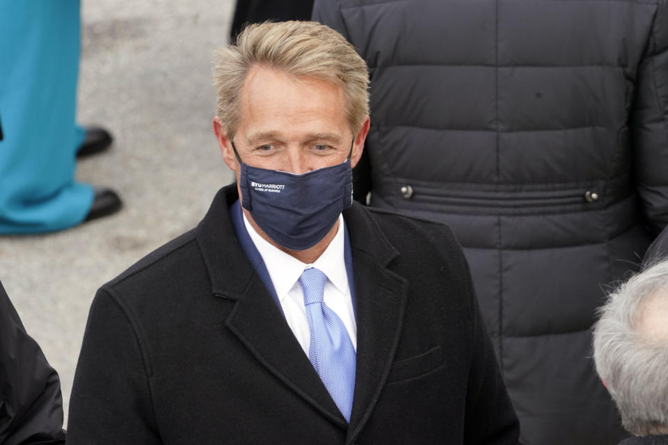 Former Arizona Sen. Jeff Flake arrives for the inauguration of President-elect Joe Biden during the 59th Presidential Inauguration at the U.S. Capitol in Washington, Wednesday, Jan. 20, 2021. (AP Photo/Andrew Harnik)