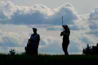 Nasa Hataoka, right, of Japan, follows her shot onto the 12th green during the first round of the ShopRite LPGA Classic golf tournament, Friday, June 10, 2022, in Galloway, N.J. (AP Photo/Matt Rourke)