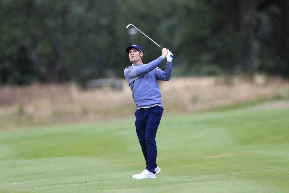 Italy's Lorenzo Scalise plays from the fairway during day one of the British Masters at Close House Golf Club, near Newcastle, England, Wednesday July 22, 2020. The European Tour resumes in earnest after its pandemic-induced shutdown with the British Masters starting Wednesday with plans for players and caddies to be virus tested regularly during the week. (Mike Egerton/PA via AP)