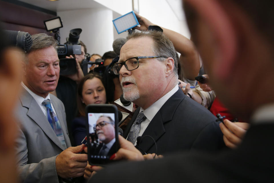 Sacramento County Assistant Chief Deputy District Attorney Rod Norgaard talks to reporters after the first court appearance of Adel Sambrano Ramos in the shooting death of Sacramento Police Officer Tara O'Sullivan, in Sacramento County Superior Court, Monday, June 24, 2019, in Sacramento, Calif. Norgaard defended police from criticism that they took 45 minutes to rescue O'Sullivan. (AP Photo/Rich Pedroncelli)